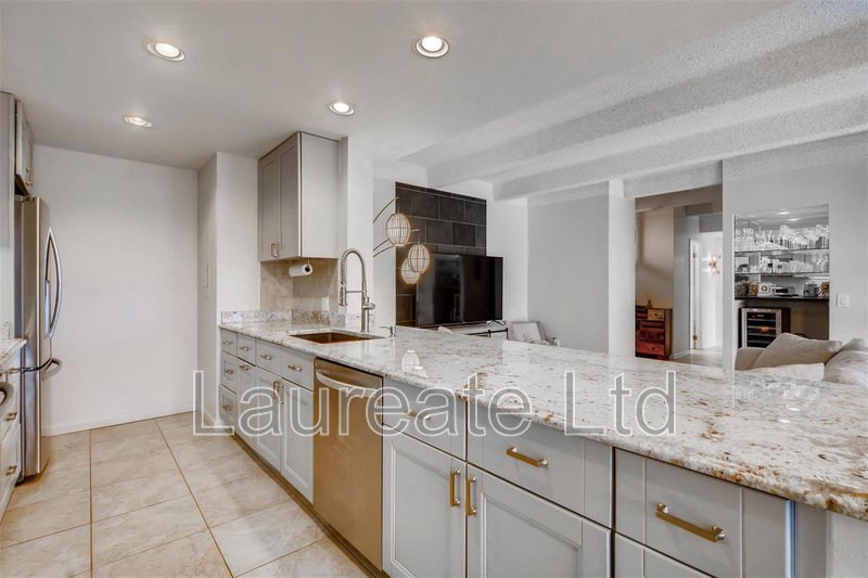 Stunning 2 Bed 2 Bath Highrise Condo with Mountain Views in SE Denver property image