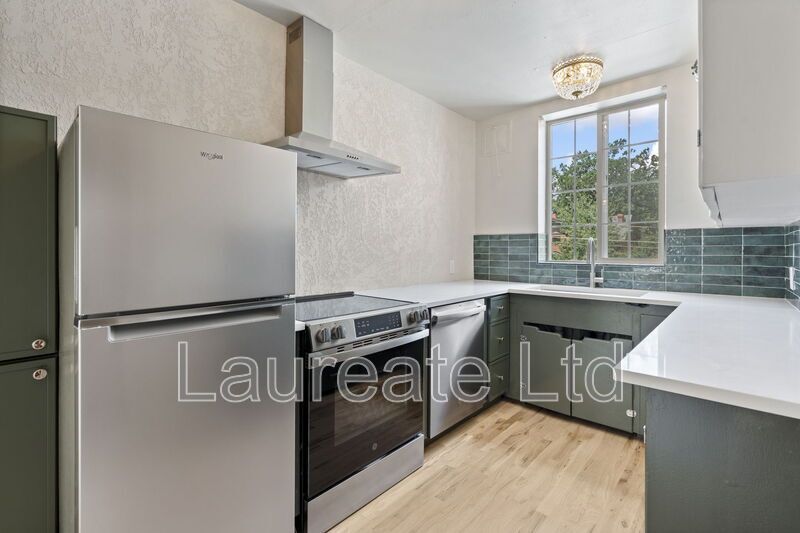 Meticulously renovated 2bd 2Ba units in Historic La Rue building in Heart of Congress Park!!! property image